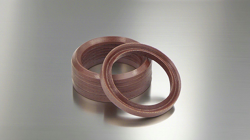 氟橡胶V型夹布油封---是由氟橡胶（FKM）+夹布密封材料制成的油封，主要应用于盾构机、冶金设备、陶瓷设备、重载油缸、油压机等